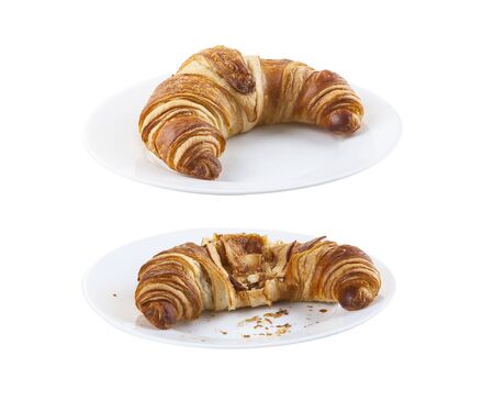 Croissant on white plate isolated on whiteの写真素材