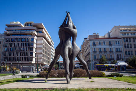 Athens Greece, April 17. 2018: Statue of âMemorial of National Reconciliationâ by Vassilis Doropoulos (1987) on Klafthmonos Squareのeditorial素材