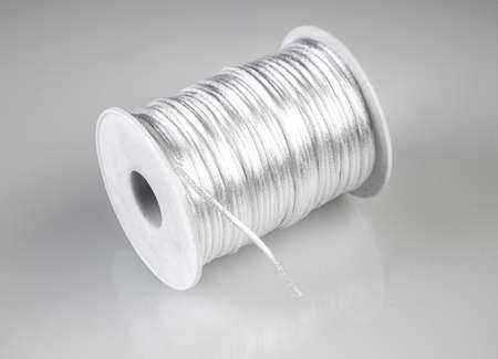 Twisted Cord spools or cotton rope. Studio shoot isolated on white background. Nautical Rope, Rope Reelの写真素材