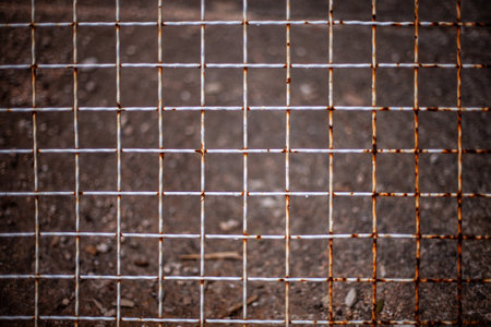 Closeup metal fence mesh grid textureの写真素材