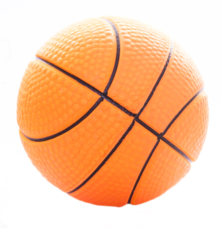 Rubber basketball isolated on whiteの写真素材