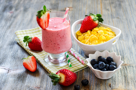Fresh healthy breakfast with berries and milk shake selective focusの写真素材