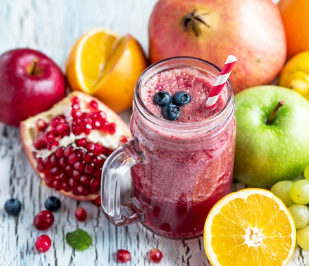 Red berry smoothie, healthy juicy vitamin drink diet or vegan food concept, fresh vitamins, homemade refreshing fruit beverageの写真素材