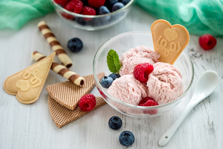 Ice cream with berries and waffles, summer dessert, sweet snack, sorbetの写真素材