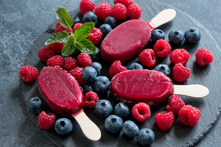 ice stick ice cream with berries, sorbet summer dessert, sweet snackの写真素材