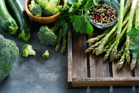 Green vegetables for healthy cooking, harvest or diet concept, asparagus, zucchini, broccoli, vegan eatingの写真素材