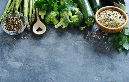 Green vegetables and rice for healthy cooking, food copy space background, asparagus, zucchini, broccoli, vegan eatingの写真素材