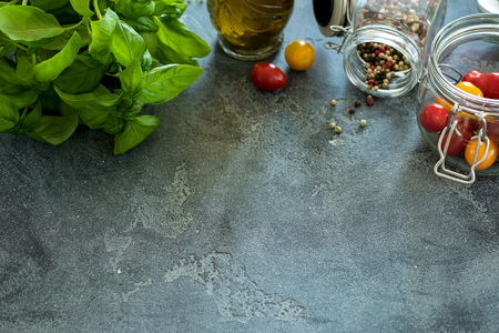 Cooking ingredients copy space food background, basil, tomatoes, pepper, oil, healthy eating, vegan and diet conceptの写真素材