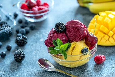 Ice cream, fruits and berries sorbet, summer dessert, sweet snackの写真素材