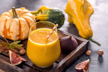 Healthy pumpkin smoothie, fresh vegan autumn drinkの写真素材