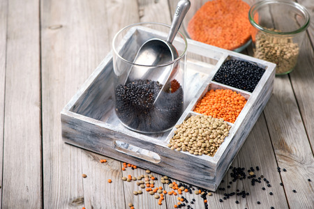 Different types of lentils for healthy vegan cooking, red, black and green lentils, vegan proteinの写真素材