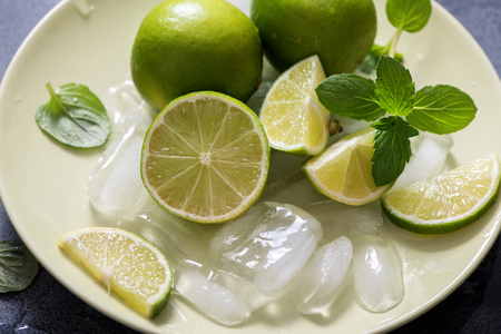 Lime and mint, ingredients for refreshing drink, lemonade or mojito cocktail,  healthy fruitsの写真素材