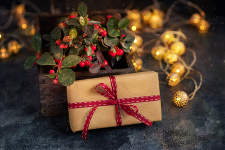 Christmas gift or present box with sparkling bokeh lightsの写真素材