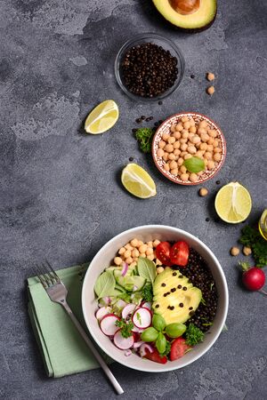 Fresh chickpea and lentil salad with veggies and avocado, vegan lunch bowl or healthy snack, clean eanting and detox food conceptの写真素材