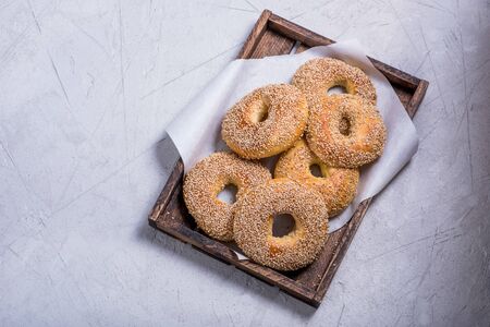 Fresh baked bagels in wooden box copy space backgroundの写真素材