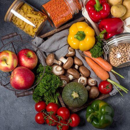 Eco-friendly lifestyle and shopping, zero waste, healthy organic vegetables and fruits in reusable cotton bag and glass jars, plasticfreeの写真素材