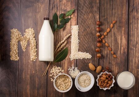 Plant based vegan milk, letters made of various  ingredients for plant milkの写真素材
