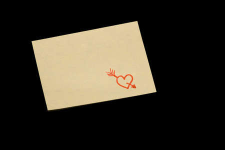 Yellow note with a red heart