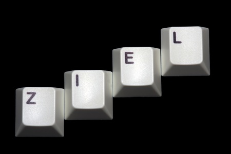 Single keys that show the word aim with black backgroundの写真素材
