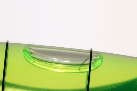 A closeup of a level with a white backgroundの写真素材