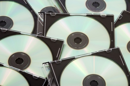 A lot of blank compact discs in casesの写真素材