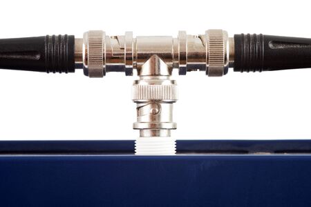 Old network connection with a blue switch over a white backgroundの写真素材