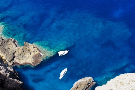 Two boats in a wonderful bay in Mediterranean Seaの写真素材