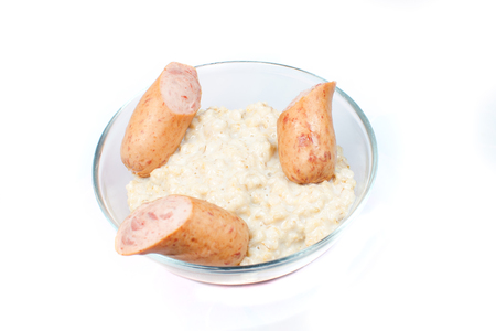 Oatmeal with sausagesの写真素材