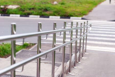 Metal handrails on crossing the roadの写真素材