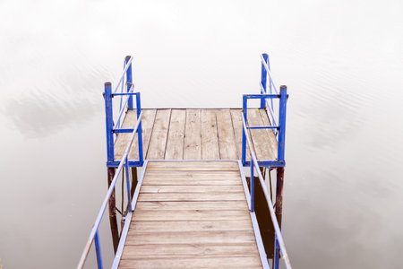 Pier for fishing on the lake.の写真素材