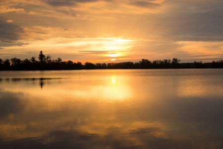 Sunset by the lakeの写真素材