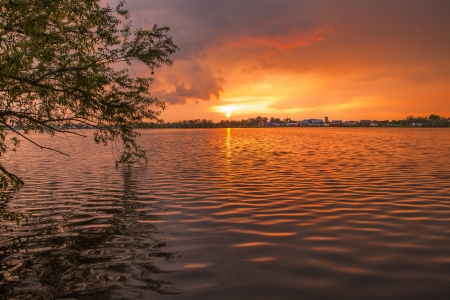 Sunset by the lakeの写真素材