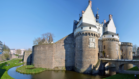 View at Castle of the Dukes of Brittany in Nantes Entrance in the right hand and the walk down from park place fortification wallsのeditorial素材