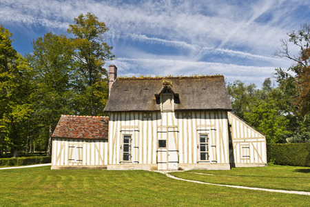 Anglo Chinese garden with original Hamlet make a pleasance part of Chantilly Castle Park, Oise, Franceのeditorial素材