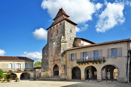 Fortified church and city Hall building in Royal square of Labastide d Armagnac, in the center of ancient bastide in Aquitaine, Franceのeditorial素材