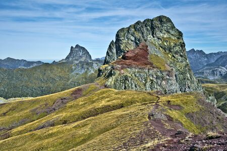 Peak Anayet 2575 m in Spanish Aragon and peak Midi d Ossau 2807 m in French Bearn seen from Vertice d Anayet 2559 m in Pyrenees mountainsの写真素材