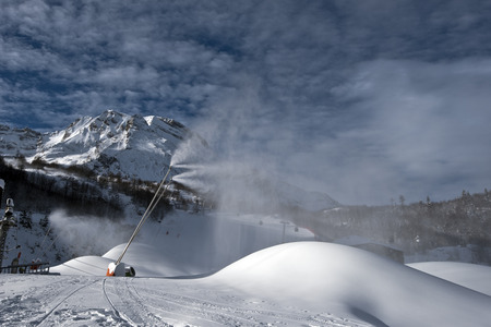 The Snow lances works along ski slopes, its the Morning time in Gourette winter sports resort in...