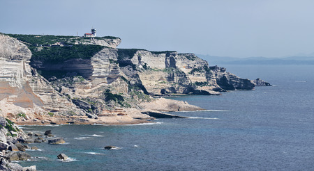 Limestone Cliffs seen from Bonifacio with Pertusato lighthouse. Corsica Island, Franceの写真素材