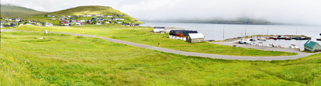 Panoramic view of Hosvik Village and harbor in Faroese island of Streymoyの写真素材