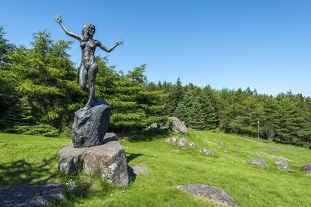 Torshavn, Faroe - July 11, 2018 Statue in memory of William Heinesen by Hans Pauli Olsen in Vioarlundin Park, Torshavn, Faroese island of Streymoyのeditorial素材
