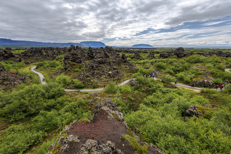 View at tourist area of Dimmu Borgir Lavafeld in the East of Mytavn lake in Northern Iceland.の写真素材