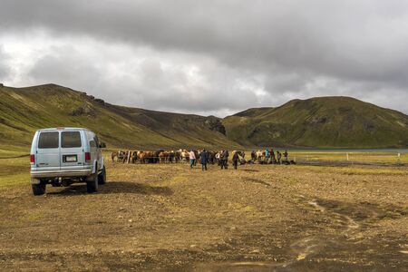 Fjallabak, Iceland 21 July, 2018 People preparing for Icelandic horse riding in Fridland ad Fjallabaki Natural park in Highlands of Icelandのeditorial素材