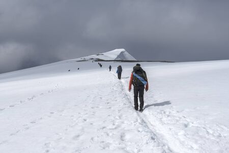 Lom, Norway ? ?? July 29, 2017 Hikers in glittertinden mountain summit, glacier glacier.