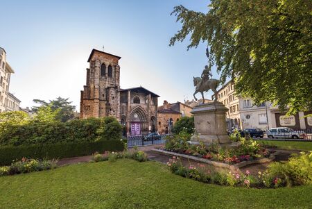 Saint-Etienne, France - July 29, 2019 Saint Stephen Church as seen from Boivin square. John of Arc monument is at right foreground.のeditorial素材