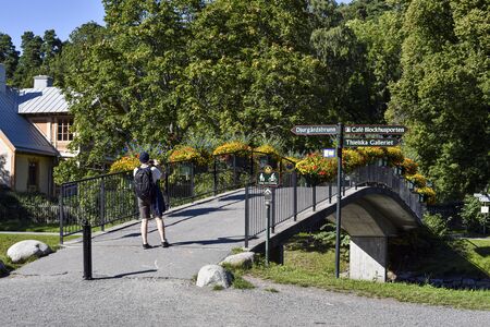 Stockholm, Sweden -August 18, 2017 Picturesque bridge through the Royal Chanel Tour, as seen from Djurgarden island side.のeditorial素材