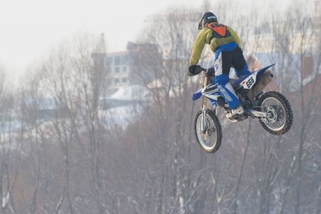 Winter Motocross. Motocross Championship "Russian Winter 2016" in the city of Cheboksary, Chuvash Republic, Russia.のeditorial素材