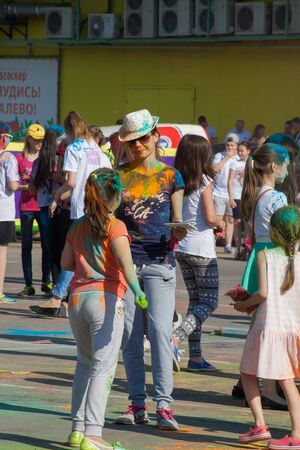 Mother and daughter talk. The festival of colors Holi in Cheboksary, Chuvash Republic, Russia. 05/28/2016のeditorial素材