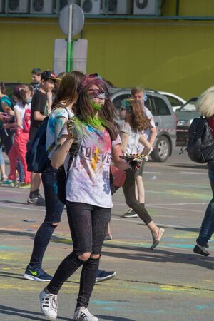 Girl with gouache hands. The festival of colors Holi in Cheboksary, Chuvash Republic, Russia. 05/28/2016のeditorial素材
