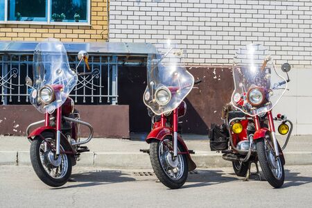 Three JAVA motorcycle retro stand against the wall. City Cheboksary, Chuvash Republic, Russia....