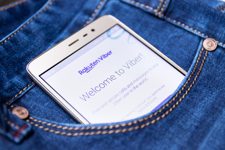 Icon viber on the screen of a smartphone in your jeans pocket. Cheboksary, Russia, 02/17/2019のeditorial素材